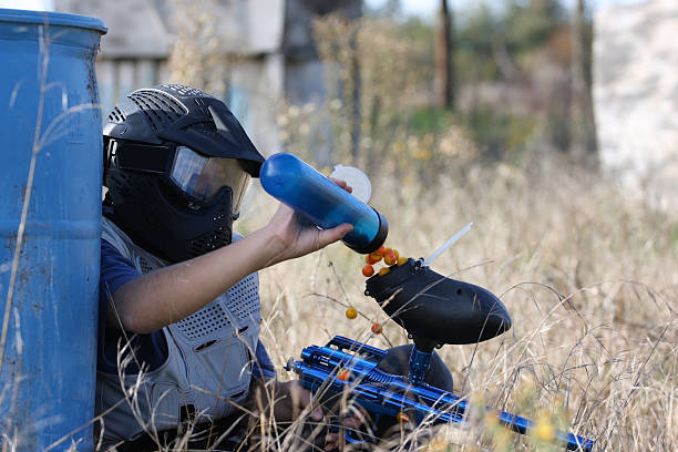 Paintball Reload 410+ Kids Playing Paintball Stock Photos, Pictures & Royalty-Free ...