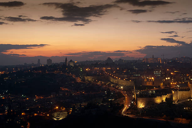 Beautiful panoramic aerial view of the Old City, Tomb of the Prophets and Dome of the Rock. Blue Sunny and Cloudy Sky Overlay. Jerusalem, Capital of Israel. Historic Architecture