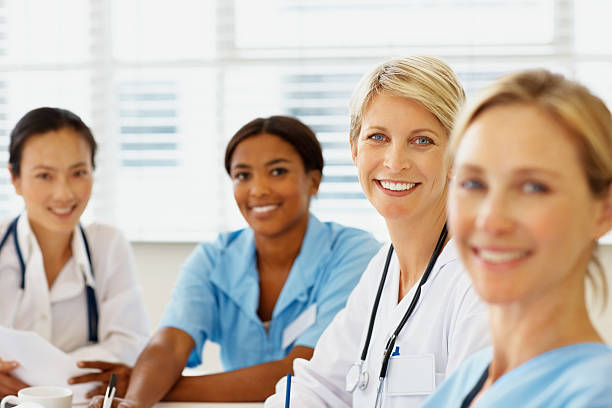 istock Group of a female doctors sitting together 182361136