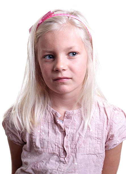 teenage cute blond girl thinking, frustrated, emotional on white background, thumbs up cheerful closeup messed hair