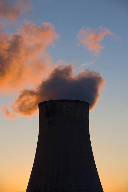 istock Cooling tower at a coal fueled power station. 182361875