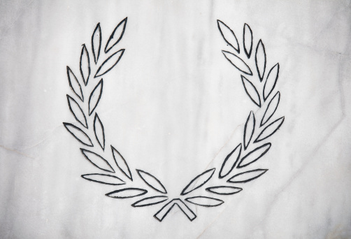 Golden laurel wreath on white background. Isolated with clipping path. 3d