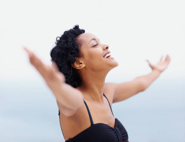 istock Victory ! - Happy young female with open arms 182362378