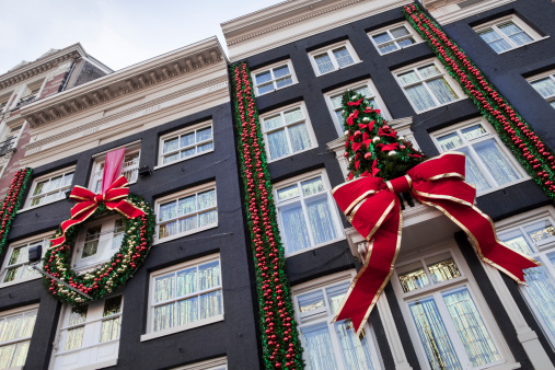 Several buildings in a row decorated for Christmas (XXL)