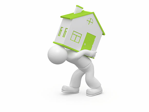 3D character carrying the house. stock photo