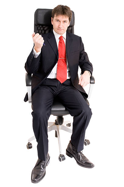 istock Businessman on a Chair 182363779