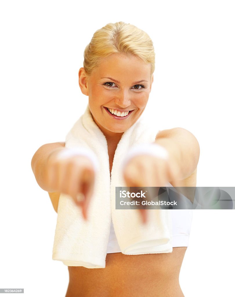 Ritratto di un sorridente giovane donna che punta su di te - Foto stock royalty-free di 20-24 anni