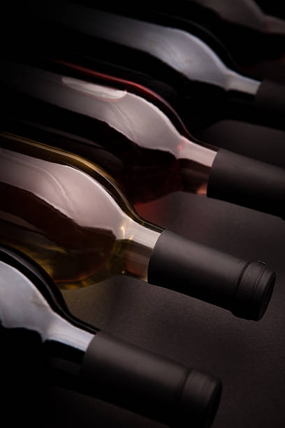istock Row of Wine Bottles 182365346