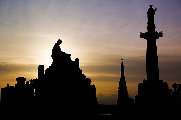 istock Silhouettes of Victorian Tombs 182365596