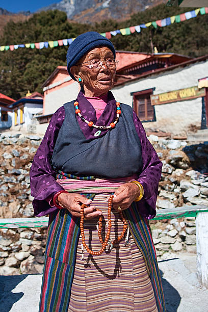 istock Nepali woman with rosary 182367353