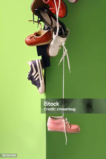 Foto de Calçados Infantis e mais fotos de stock de Parede - Parede, Sapato de Lona, Tênis - Calçados Esportivos