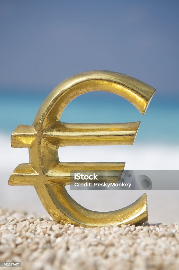 Golden Euro Stands On Bright Pebble Beach Stock Photo Download Image euro-coins-value-rarity-identification-and-collections