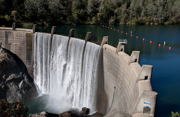 Water Reservoir Dam Wall Rocks Concrete FUll Drinking Drought stock photo