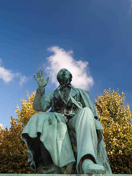 Hans Chrisitian Andersen "August Saabyes statue of H. C. Andersen from 1877 is located in the Kings Garden near Rosenborg Castle in the center of Copenhagen, Denmark," statue of hans christian andersen stock pictures, royalty-free photos & images