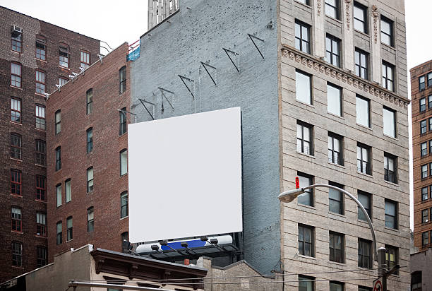 cartelera en la ciudad de nueva york - valla publicitaria fotografías e imágenes de stock