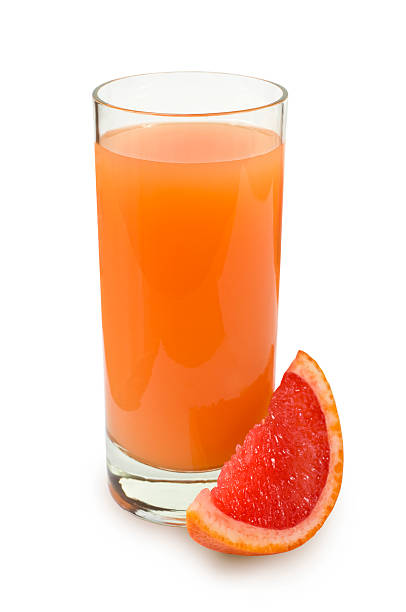 Jugo de toronja (pomelo) - foto de stock