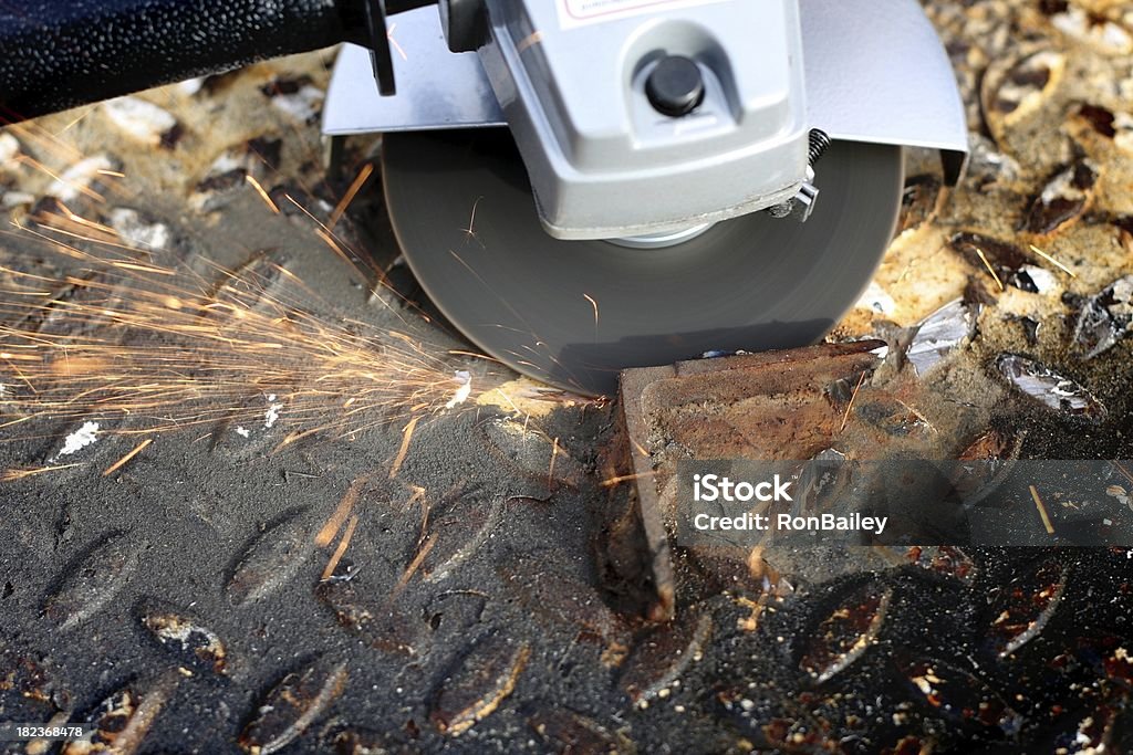 Cutting a Weld "An angle grinder being used to cut a welded piece of angle-iron off of a piece of painted, diamond-plate.All images in this series..." Blurred Motion Stock Photo