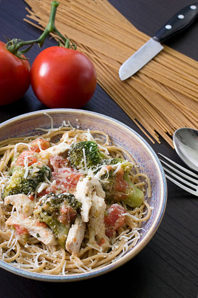 istock Parmesan chicken and broccoli with whole wheat spaghetti 182369103