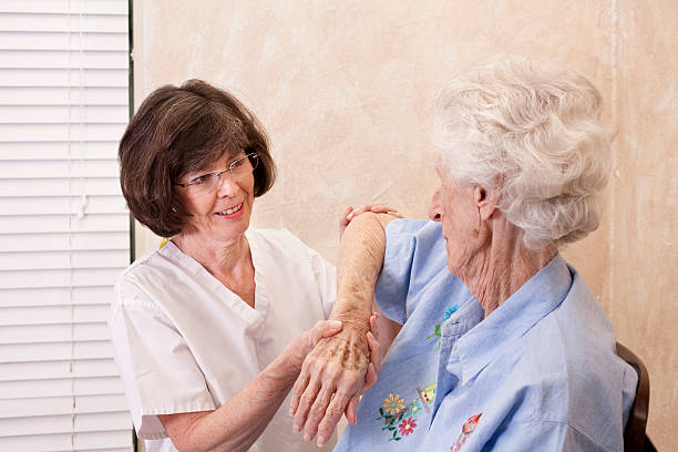 istock Senior woman having physical therapy 182369331