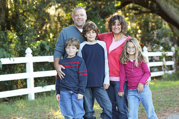istock Family of five posing 182369362