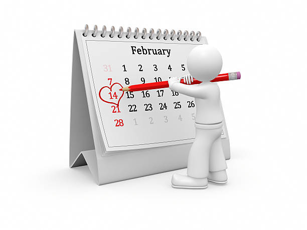 3D guy marking 14 february with heart. 3D guy marking 14 february with heart. desk calendar february 2010 stock pictures, royalty-free photos & images