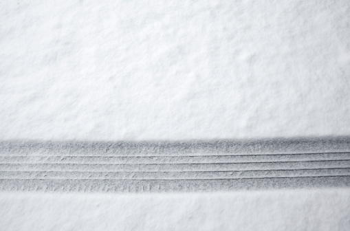 Tire track in fresh snow.