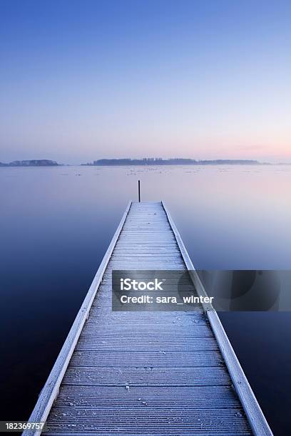 Jetty On A Still Lake In Winter In The Netherlands Stock Photo - Download Image Now - Boardwalk, Jetty, Lake