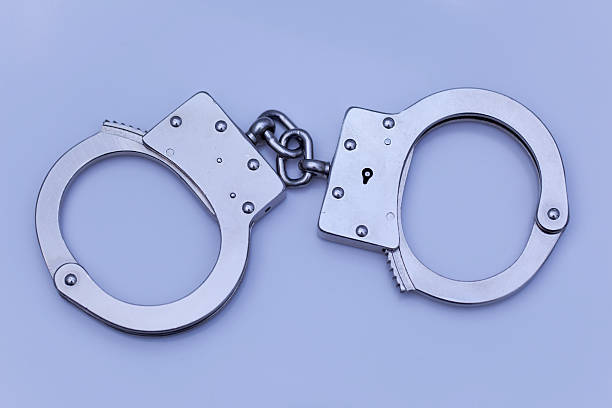 istock Toned image of handcuffs. 182369789