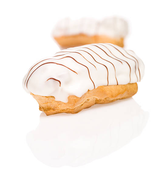 Eclair with glazing and caramel strips