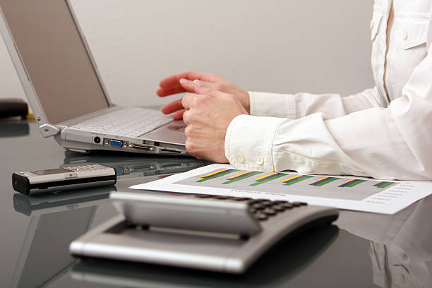 Business woman with notebook in the office stock photo