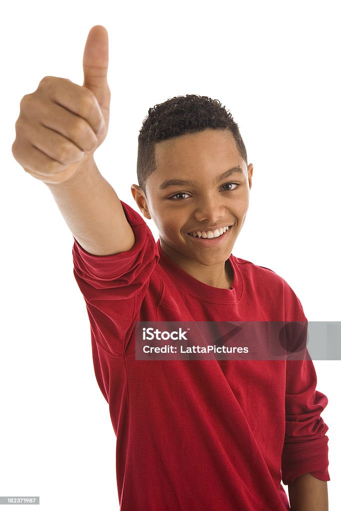 Africian ethnicity teenage boy gesturing thumbs up "African ethnicity teenage girl with thumbs up sign, isolated on white background" Teenage Boys Stock Photo