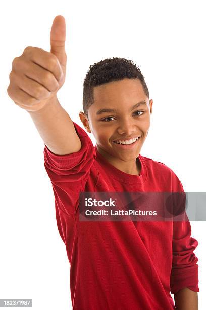 Africian Ethnicity Teenage Boy Gesturing Thumbs Up Stock Photo - Download Image Now - Teenage Boys, 12-13 Years, Thumbs Up