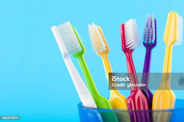 Colorful Toothbrushes In Glass Stock Photo - Download Image Now - Toothbrush, Multi Colored, Beauty