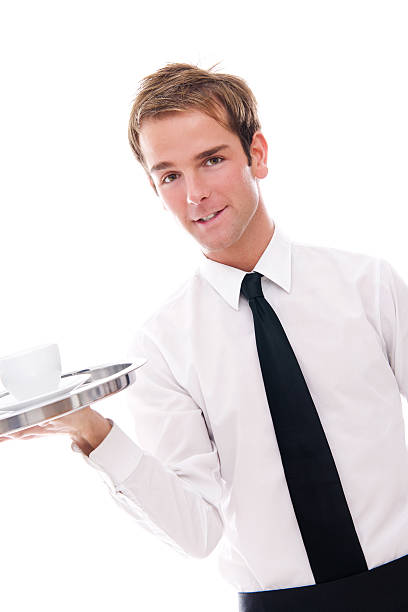 istock Young Waiter Holding a Tray w/ Coffee Cup 182372929