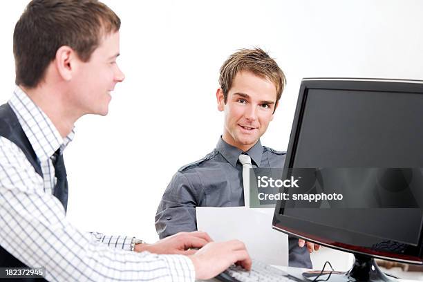 Computer And A Men Two Men Working At A Computer Stock Photo - Download Image Now - 25-29 ...