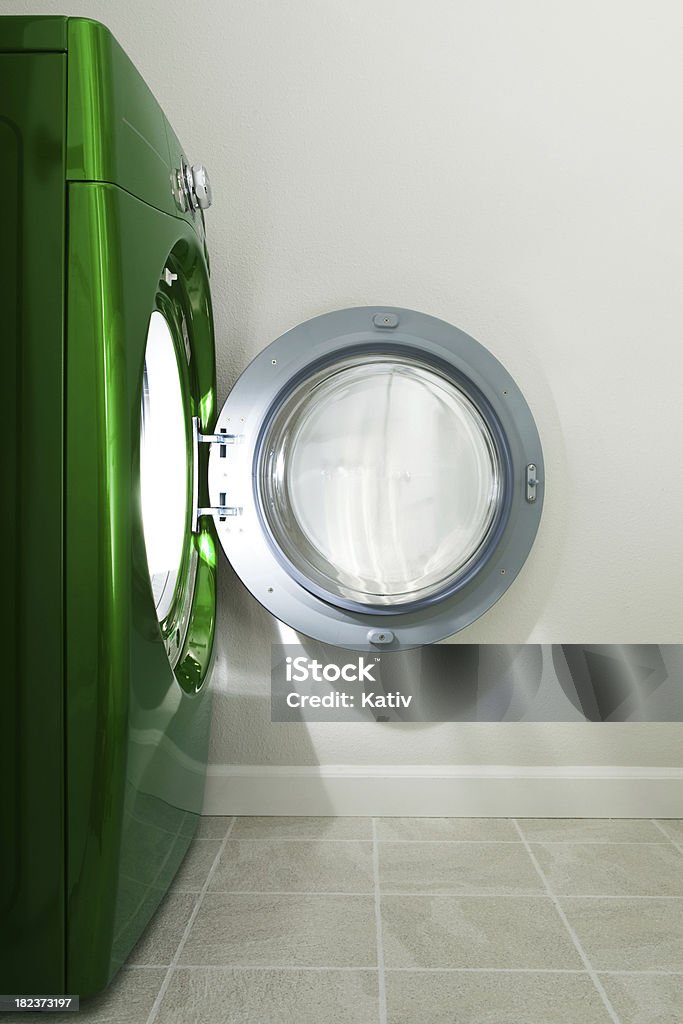 Opened Door Opened door of a green washing machine. Greenwashing Stock Photo