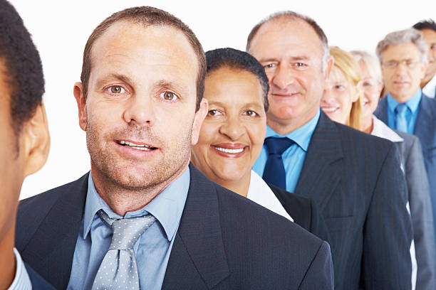 istock Business man standing in line with colleagues 182374210