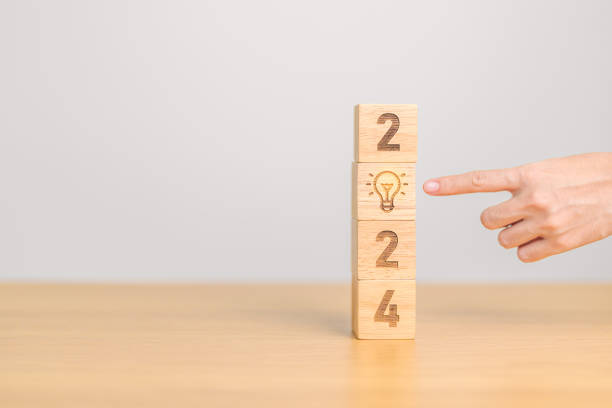 istock 2024 block with lightbulb. Business Idea, Creative, Thinking, brainstorm, Goal, Resolution, strategy, plan, Action, change and New Year start concepts 1823747349