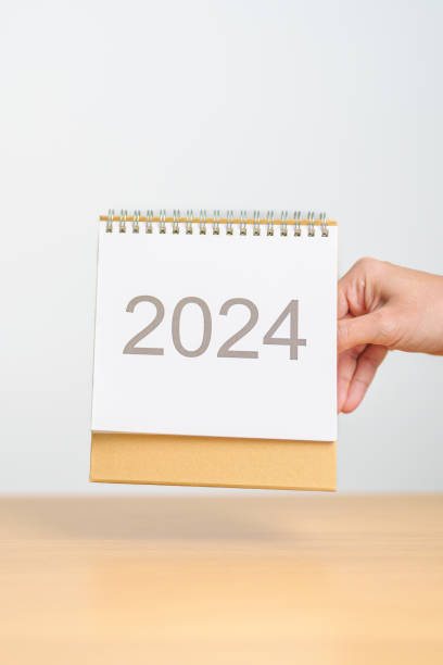 istock 2024 Year Calendar on table background. Happy New Year, Resolution, Goals, Plan,  Action, Mission and financial Concept 1823747355