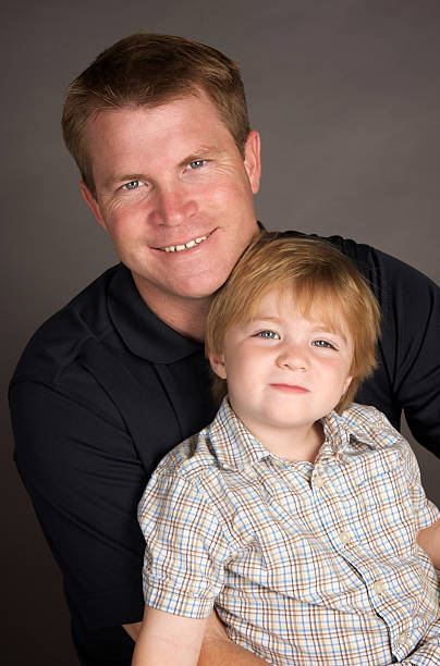 Portrait of a Handsome Father and Two Year Old Son