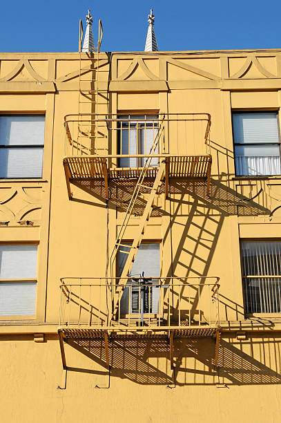 istock Fire escapes on apartment building 182375163