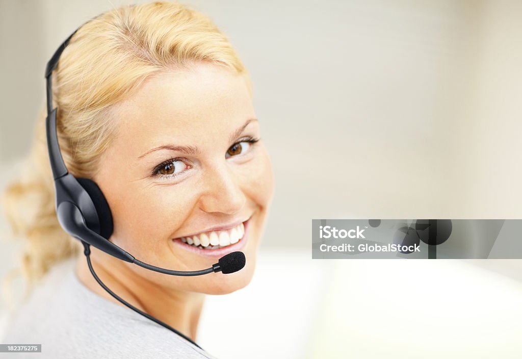 Porträt ein lächelnd call-center-Mitarbeiter - Lizenzfrei Telefonist Stock-Foto