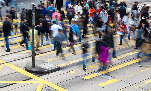 istock Busy crosswalk with motion blurred pedestrian 182375515