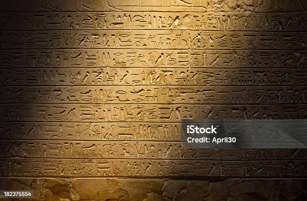 Ancient Hieroglyphics Dimly Lit Stock Photo - Download Image Now - Hieroglyphics, Ancient, Antiquities