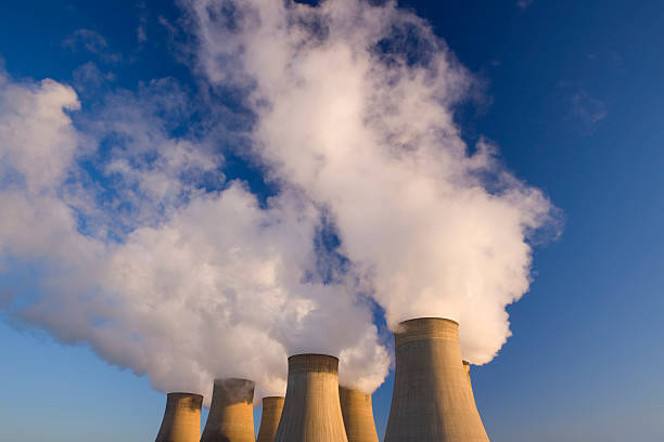 istock Cooling towers at a coal fueled power station. 182375601