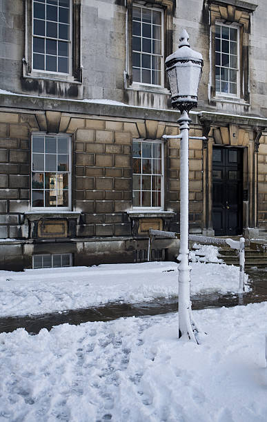 istock Old fashioned Street lamp covered in snow 182376067