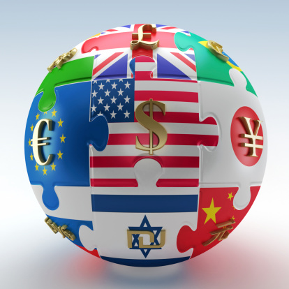 Countries' flags as puzzle parts with currency symbols on them mapped to a sphere representing united world economies. This file contains a clipping path.Similar images: