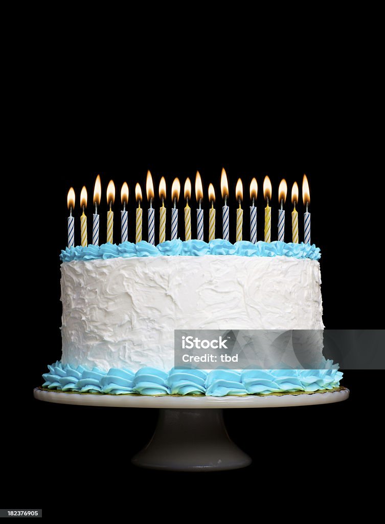 Birthday Cake A birthday/celebration cake with lit candles against a pure black background. Birthday Cake Stock Photo