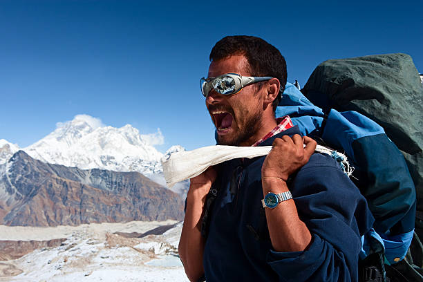 istock Nepali porter against a background of Mount Everest 182377055