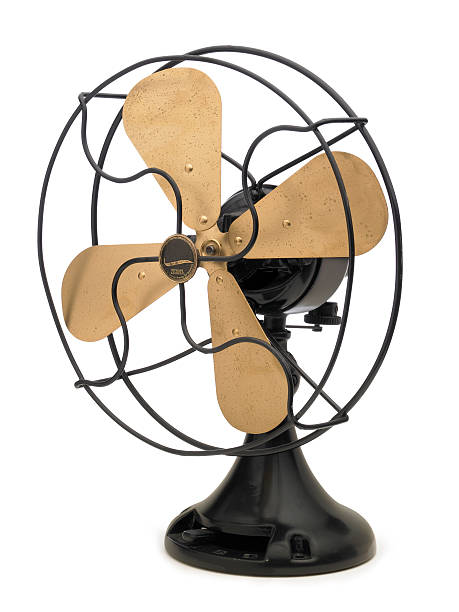 istock Antique Fan with brass blades on white background 182377567